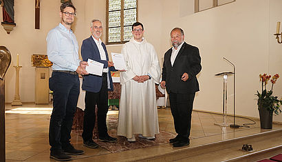 Phillip Hülshörster (Kirchenvorstand),  Reinhold Gebbe (Pfarreirat), Michel Dornbusch (Pastoralassistent) und Thomas Kamp-Deister (Referatsleiter Schöpfungsbewahrung)