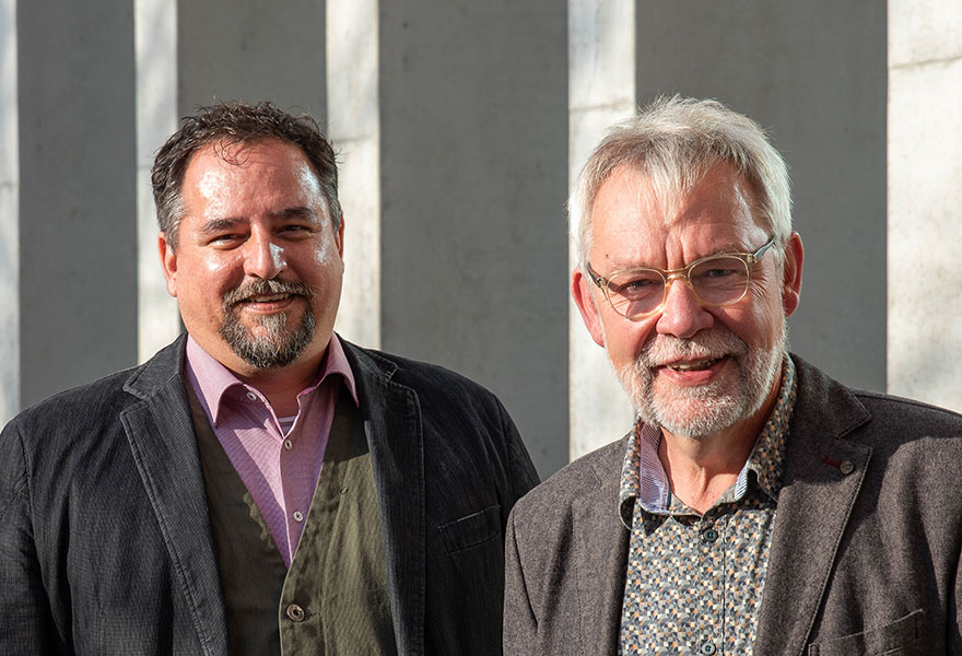 René Franken und Michael Oetterer stehen nebeneinander und lächeln in die Kamera.