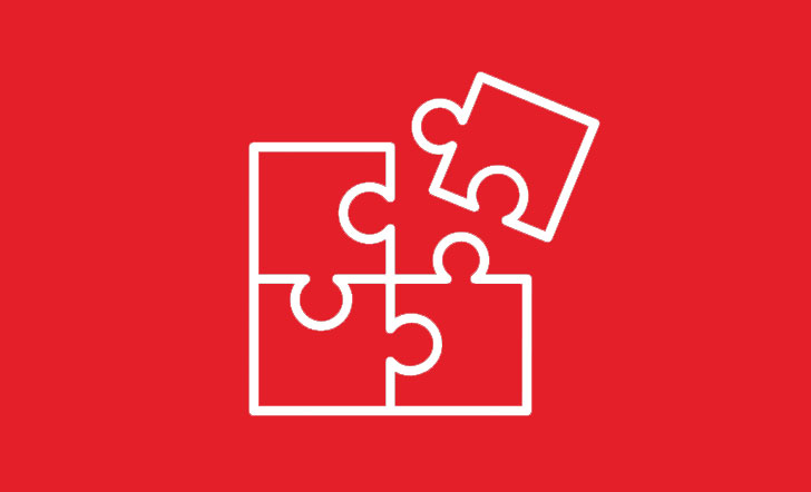 Symbolbild: Vier Puzzleteile, die ineinander greifen